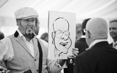 Our caricaturist creates amazing souvenirs as he mingles with duests during the drinks reception